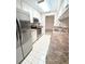 Kitchen with stainless steel appliances and light cabinets at 8040 Pasadena Dr, Port Richey, FL 34668