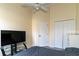Bedroom with a queen-size bed and ceiling fan at 9042 Moonlit Meadows Loop, Riverview, FL 33578