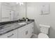 Bathroom with granite countertop and walk-in shower at 1111 41St W St, Bradenton, FL 34205