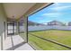 Screened porch overlooking backyard at 13167 Royal Pines Ave, Riverview, FL 33579