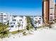 White condos on the beach are within walking distance of beach and water activities at 17960 Gulf Blvd # 123, Redington Shores, FL 33708