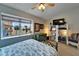 Relaxing bedroom featuring ceiling fan, natural light, and a serene decor at 17960 Gulf Blvd # 123, Redington Shores, FL 33708