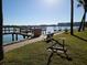 Wooden dock with benches and exercise equipment at 17960 Gulf Blvd # 123, Redington Shores, FL 33708