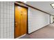 Apartment building hallway with door to unit 105 at 2579 Countryside Blvd # 1105, Clearwater, FL 33761
