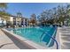 Inviting community pool with plenty of lounge chairs at 2579 Countryside Blvd # 1105, Clearwater, FL 33761