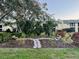 Landscaped grounds with stone path and benches at 3001 58Th S Ave # 901, St Petersburg, FL 33712