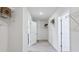 Spacious hallway with walk-in closets and ample storage at 32513 Osprey Peak Way, San Antonio, FL 33576