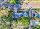 Birds-eye view of the house with brick streets, mature trees, and neighboring property with pool at 415 21St N St, St Petersburg, FL 33713