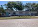 Charming single story home with a well-maintained lawn and quaint curb appeal at 415 21St N St, St Petersburg, FL 33713