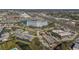 Aerial view showcasing a high-rise building and nearby businesses at 4939 Floramar Ter # 501, New Port Richey, FL 34652