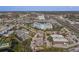Aerial view of residential neighborhood near waterways and businesses at 4939 Floramar Ter # 501, New Port Richey, FL 34652