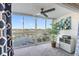 Bright sun room with floor to ceiling windows offering water views at 4939 Floramar Ter # 501, New Port Richey, FL 34652