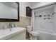 Clean bathroom with tub, shower, and updated vanity at 6926 Williams Dr, Tampa, FL 33634