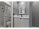 Clean bathroom with shower, toilet and vanity at 6926 Williams Dr, Tampa, FL 33634