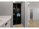 Small bathroom with linen closet and sink at 6926 Williams Dr, Tampa, FL 33634
