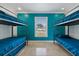 Bright bedroom with two twin bunk beds and teal walls at 6926 Williams Dr, Tampa, FL 33634