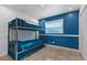 Bedroom featuring a twin-over-full bunk bed at 6926 Williams Dr, Tampa, FL 33634