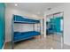 Bedroom with twin bunk beds and mirrored closet at 6926 Williams Dr, Tampa, FL 33634