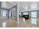 Entryway with tile floors, showing access to living room and front door at 6926 Williams Dr, Tampa, FL 33634