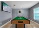Game room with pool table and TV at 6926 Williams Dr, Tampa, FL 33634