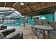 Enjoy this screened-in pool and patio area at 6926 Williams Dr, Tampa, FL 33634