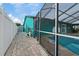 Brick patio next to the pool and screened enclosure at 6926 Williams Dr, Tampa, FL 33634
