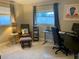 Inviting home office featuring a comfortable chair, desk, and ample workspace at 6951 S Shore S Dr, South Pasadena, FL 33707