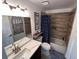Clean bathroom with tub and shower, updated vanity at 1005 Lake Avoca Pl, Tarpon Springs, FL 34689