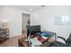 Home office with a large desk, two monitors, and ample workspace at 11312 Gallatin Trl, Parrish, FL 34219