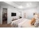 Main bedroom with king bed, walk-in closet, and ensuite bathroom access at 11312 Gallatin Trl, Parrish, FL 34219