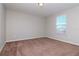 Bedroom with window and closet at 13419 Lake Monroe Pl, Riverview, FL 33579