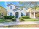 Charming two-story home with manicured landscaping and a welcoming entrance at 13419 Lake Monroe Pl, Riverview, FL 33579