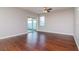 Spacious Gathering room with sliding glass doors to patio at 13419 Lake Monroe Pl, Riverview, FL 33579