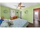 Bright bedroom with a queen-size bed and built-in closet at 1602 30Th W St, Bradenton, FL 34205