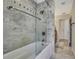 Bathroom with glass shower and modern fixtures at 19505 Coachlight Way, Lutz, FL 33549