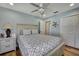 Bedroom with a view of a hallway and double doors at 19505 Coachlight Way, Lutz, FL 33549