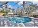Screened pool and spa with patio at 19505 Coachlight Way, Lutz, FL 33549