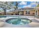 Enjoy this luxurious pool and spa at 19505 Coachlight Way, Lutz, FL 33549