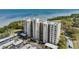 High-rise building near water with parking and landscaping at 2616 Cove Cay Dr # 503, Clearwater, FL 33760