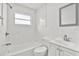 Stylish bathroom with marble-look tile and a modern sink at 4916 Carlyle Rd, Tampa, FL 33615