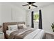 Guest bedroom with a queen-size bed and a calming atmosphere at 4916 Carlyle Rd, Tampa, FL 33615
