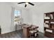 Functional home office featuring a modern desk and built-in shelving at 4916 Carlyle Rd, Tampa, FL 33615