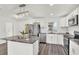 Modern kitchen with stainless steel appliances and granite countertops at 4916 Carlyle Rd, Tampa, FL 33615