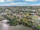 Aerial view highlighting house's location near the lake at 5269 61St N Way, Kenneth City, FL 33709