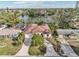 Aerial view showcasing house and the surrounding neighborhood at 5269 61St N Way, Kenneth City, FL 33709