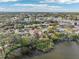 Aerial view of house by the lake in a residential neighborhood at 5269 61St N Way, Kenneth City, FL 33709