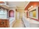 Bathroom with double vanity, garden tub and walk-in shower at 5269 61St N Way, Kenneth City, FL 33709