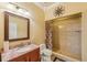 Bathroom with shower, toilet, vanity, and granite countertop at 5269 61St N Way, Kenneth City, FL 33709