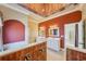 Bathroom with double vanity,large mirror and soaking tub at 5269 61St N Way, Kenneth City, FL 33709