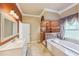 Spa-like bathroom with soaking tub and walk-in shower at 5269 61St N Way, Kenneth City, FL 33709